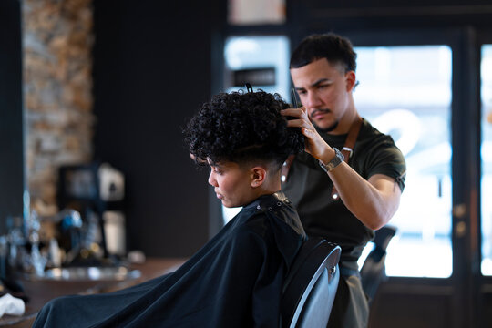Barber Cutting Curly Hair 