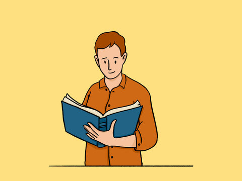 Young man reading book, studying and learning