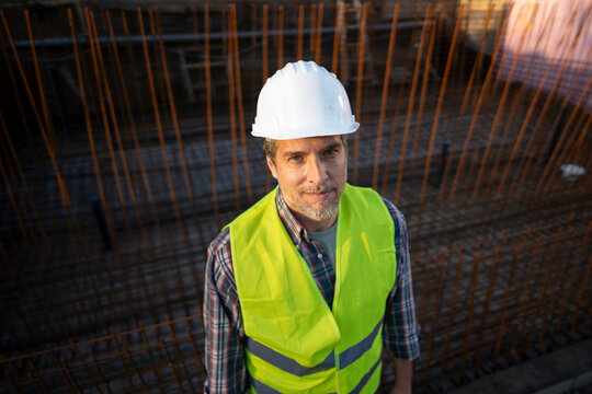 Man wearing safety gear at a construction site
