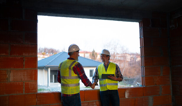 Workers gather at site for plans