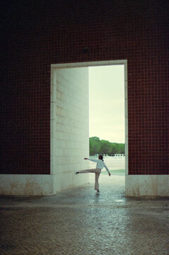 Woman in a Dark Street Doorway