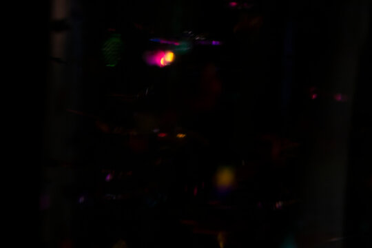 Colorful Abstract Bokeh Lights on Dark Background for Festive and Party Concepts