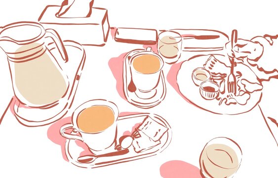 Sunny breakfast with tea and drink pitcher
