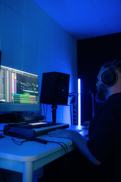 Music Production Session at Home Studio With Blue Lighting