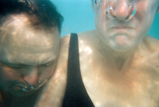 Funny Awkward Selfie of Couple Swimming Underwater in the Ocean