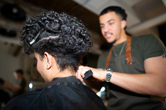 Curl styling at a hair salon in the evening