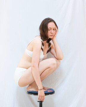 Calm portrait of a sitting woman 2