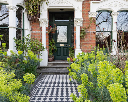 Victorian London Townhouse Entrance with Checkerboard Tiled Path and S