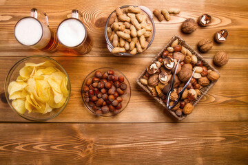 Fototapeta premium Healthy snacking with nuts and beer a delicious combination