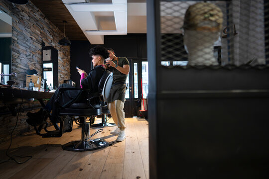 Stylish haircut in a modern salon setting