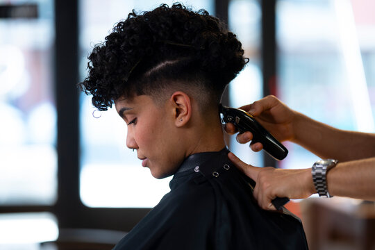 Haircut session taking place in a barbershop