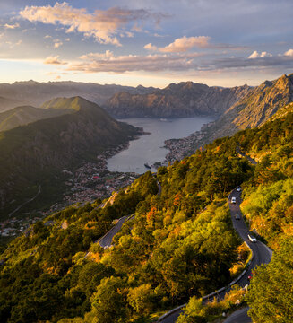 Stunning View of Kotor Bay With Winding Road and Mountains, drone shot