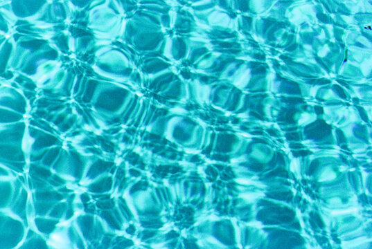 Abstract texture of water moving in swimming pool