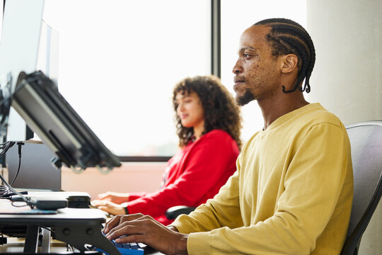 Office Workers Focused on Their Tasks