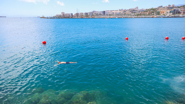 Man Relaxing in the Ocean