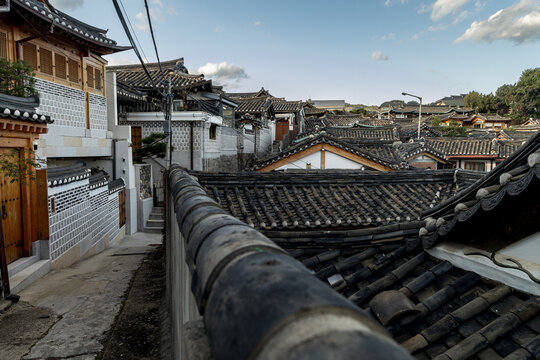 Traditional hanok village street with tiled rooftops in Seoul