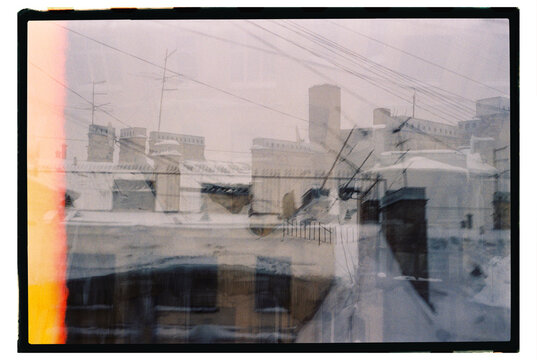 Snowy rooftops in a cold city on a winter day