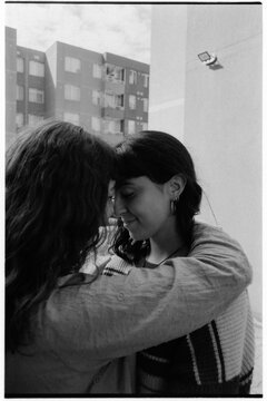 Lesbian Couple Foreheads Touching Embrace