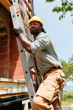 Construction Worker on Ladder