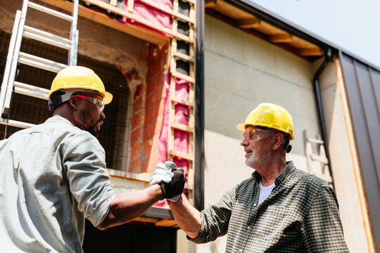 Construction Workers High Five