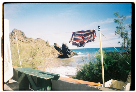 Clothes Hanging by the Sea on a Sunny Day 