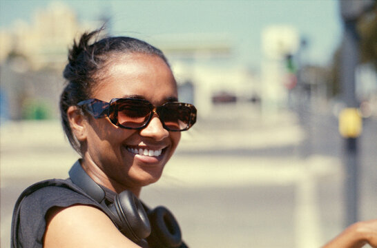 Smiling With Headphones Outdoors