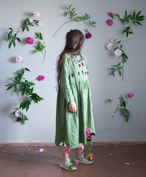 Woman standed full body surrounded by flowers 5