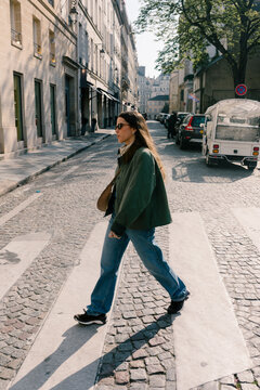 Female tourist enjoying a stroll through the streets of Paris