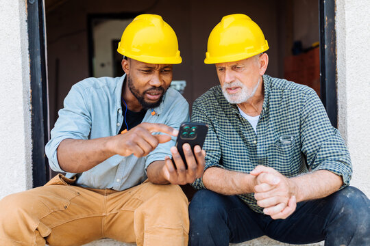 Construction Workers on the Phone
