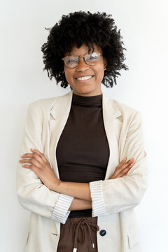 Confident african american woman smiling with arms crossed