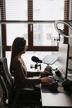 Businesswoman working in home office.