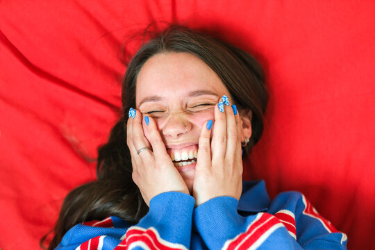 Relaxed woman reading and smiling