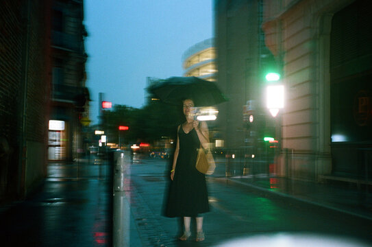 Rainy Night Walk With Umbrella in City Streets