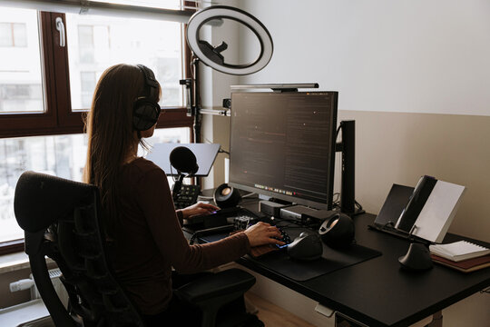 Businesswoman working in home office.