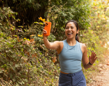 Asian fitness smile selfie cell phone Portrait 