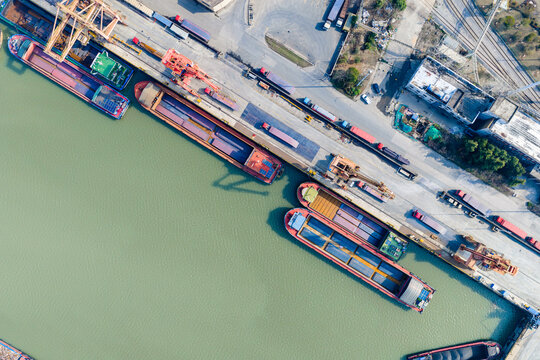 Aerial view of steel plant pier and cargo barges