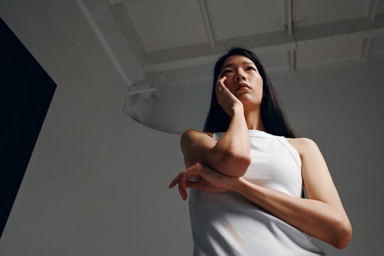 Person contemplating future with thoughtful expression