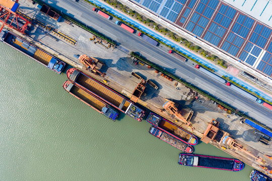 Aerial view of steel plant pier and cargo barges