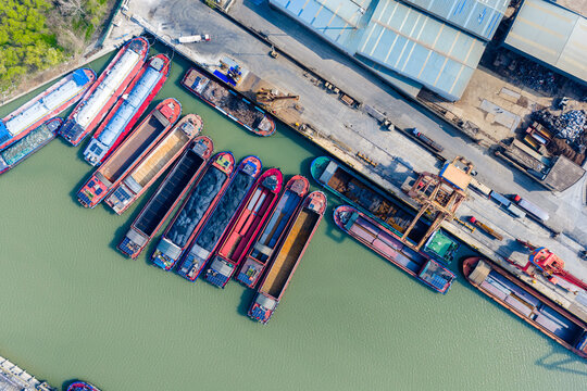 Aerial view of steel plant pier and cargo barges
