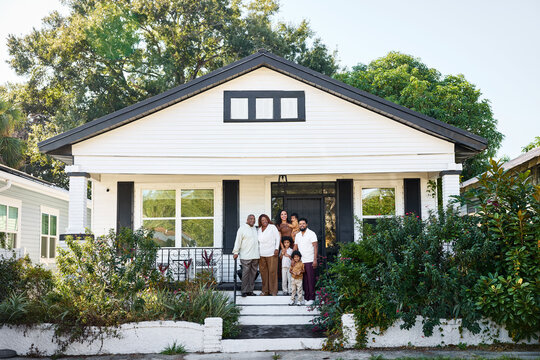Portrait of Family on Porch Together 