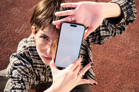 Woman With mobile Phone Outdoors