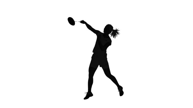 Woman playing frisbee silhouette action shot