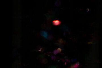 Colorful Bokeh Lights Overlay on Dark Background. Abstract Vibrant Defocused Particles and Lens Flares for Festive and Modern Designs. © Bye Bye Design