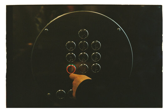 Pressing a button in an elevator