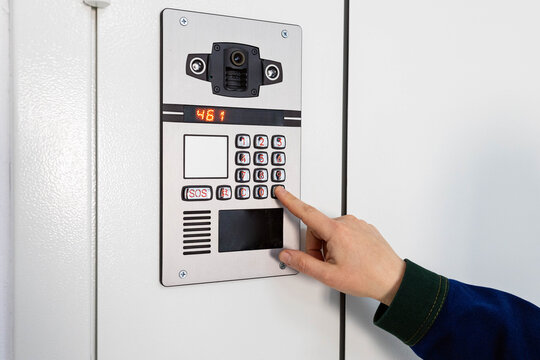 The user enters a code on the building's security system keypad.