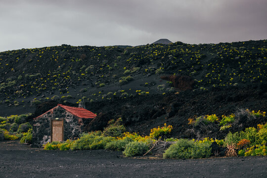 Small hut on volcanic ash landscape in La Palma, Canary Islands
