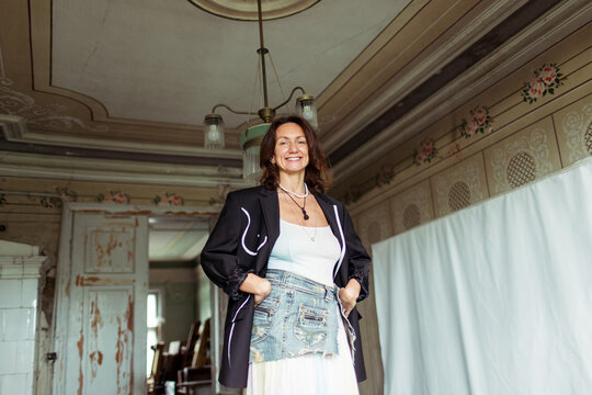 A woman spends time in her furniture restoration studio