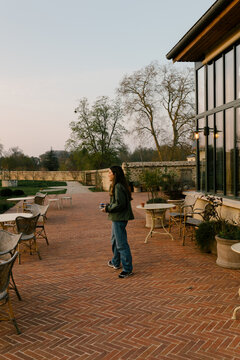 Tourist strolling through the common areas of the Le Doyenn&eacute; hotel