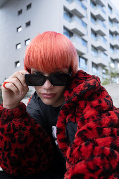 Edgy Gen Z Guy with Orange Mullet in Red Leopard Print Fur Coat