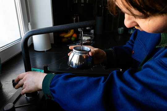 Making coffee in a kitchen during the morning